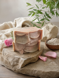 Calamine & Bentonite Face + Body Bar on stone with rose petals